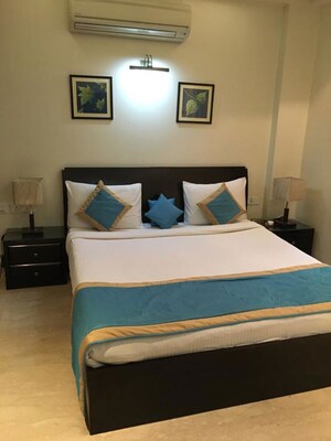 Bedroom in 3 BHK Builder Floor at Defence Colony – for Rent