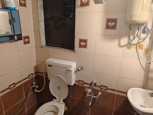 Bathroom in 3 BHK Apartment at Hari Om Heritage, Kharghar – for Rent