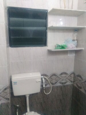 Washroom in 1 BHK Apartment at Jivraj Park – for Sale