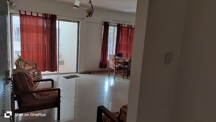 Living Room, phadnis-sahil-serene 2 Bedroom 1000 Sq.Ft. Apartment In Baner Pune 10376858