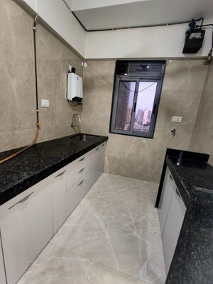Kitchen in 2 BHK Apartment at Nakul Raj , Malad West – for Rent