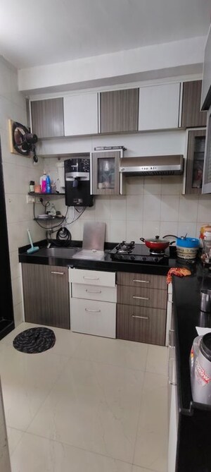 Kitchen in 1.5 BHK Apartment at Aditya Ganga CHS, Chembur – for Rent