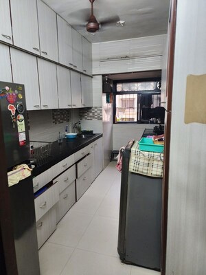 Kitchen in 3 BHK Apartment at Lokhandwala Complex – for Sale