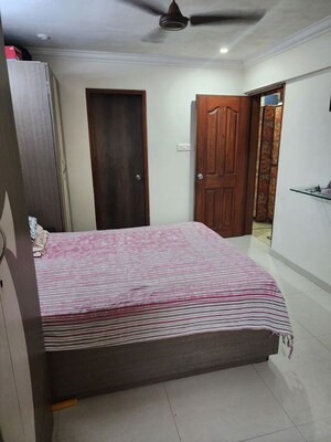 Bedroom in 3 BHK Apartment at Lokhandwala Complex – for Sale