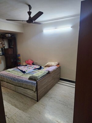 Bedroom in 3 BHK Apartment at Lokhandwala Complex – for Sale