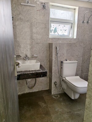 Bathroom in 3 BHK Apartment at Sikka Kaamna Greens, Sector 143a Noida – for Rent