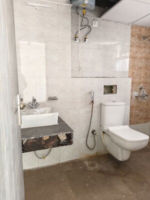Bathroom in 3 BHK Apartment at Sikka Kaamna Greens, Sector 143a Noida – for Rent