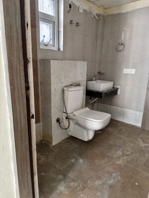 Bathroom in 3 BHK Apartment at Sikka Kaamna Greens, Sector 143a Noida – for Rent