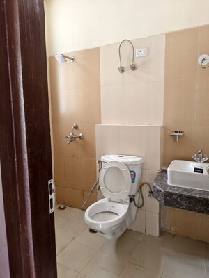 Bathroom in 2 BHK Apartment at Sikka Karnam Greens, Sector 143b – for Rent