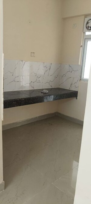 Kitchen in 2 BHK Apartment at Sikka Karnam Greens, Sector 143b – for Rent