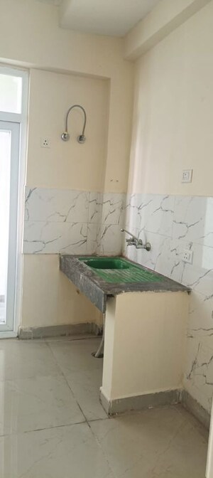 Kitchen in 2 BHK Apartment at Sikka Karnam Greens, Sector 143b – for Rent