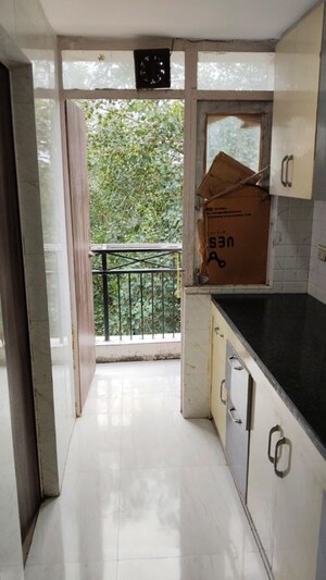Kitchen in 1 RK Apartment at IFFCO Tower, Sector 29 – for Rent