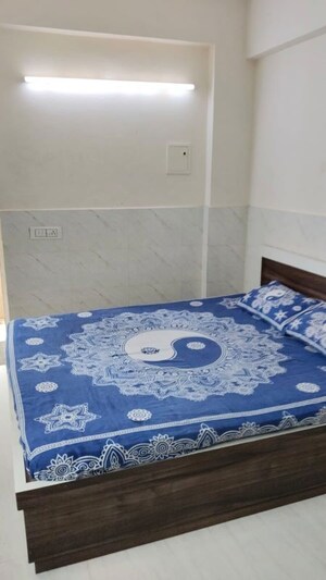 Bedroom in 1 RK Apartment at IFFCO Tower, Sector 29 – for Rent
