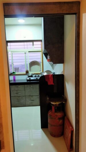 Kitchen in 2 BHK Apartment at Castle Rock, Powai – for Rent