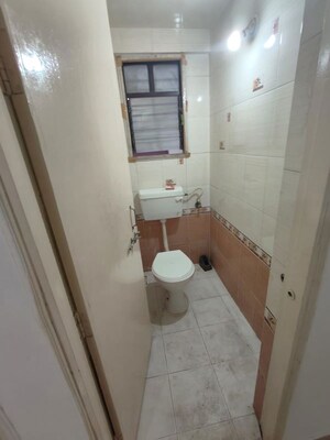 Bathroom in 2 BHK Apartment at Sadafuli Apartments Baner, Baner – for Rent