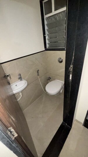 Bathroom in 1 BHK Apartment at Mhada Colony – for Rent