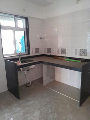 Kitchen in 2 BHK Apartment at Samet Sikar Mahal, Borivali East – for Sale
