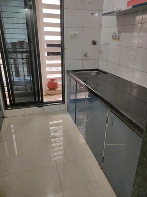 Kitchen in 1 BHK Apartment at Shagun Fountain Square, Kharghar – for Rent