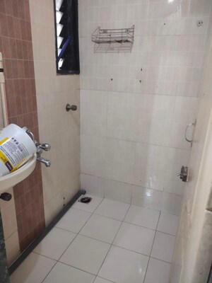 Bathroom in 1 BHK Apartment at Shagun Fountain Square, Kharghar – for Rent
