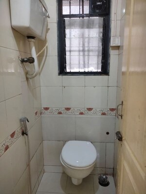 Bathroom in 1 BHK Apartment at Shagun Fountain Square, Kharghar – for Rent
