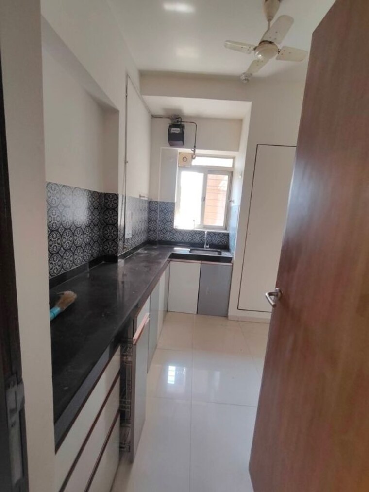 Kitchen, lodha-amara 2 Bedroom 672 Sq.Ft. Apartment In Kolshet Road Thane 10377099