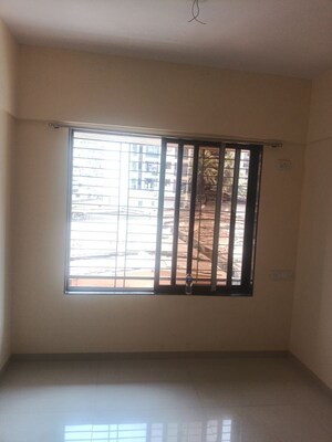 Living Room in 1 BHK Apartment at Shree Krishna Daffodil Heights, Bhandup West – for Rent
