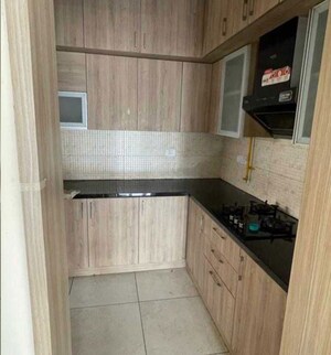Kitchen in 2 BHK Apartment at Prestige Song Of The South, Yelenahalli – for Rent