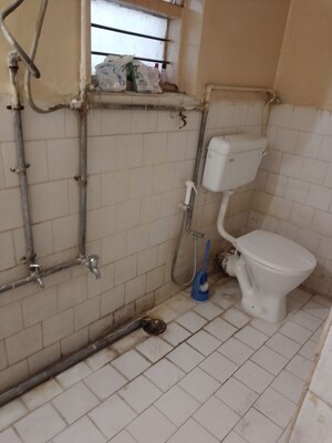 Bathroom in 1 BHK Apartment at Cozy Mansion, Camp – for Rent