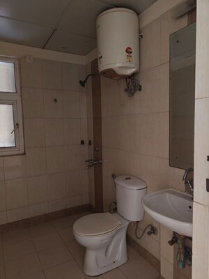 Bathroom in 2.5 BHK Apartment at Mahindra Aura Phase III, Sector 110a – for Rent