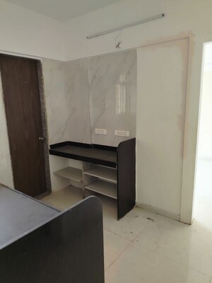 Kitchen in 2 BHK Apartment at Shree Balaji Heights Chikhali, Chikhali – for Rent