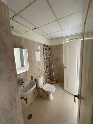 Bathroom in 3 BHK Apartment at Ansal Sushant Jeevan Enclave, Sushant Golf City – for Rent