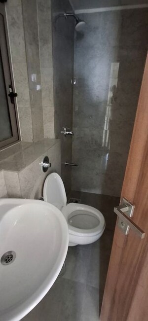 Bathroom in 2 BHK Apartment at Raj Infinia, Malad West – for Rent