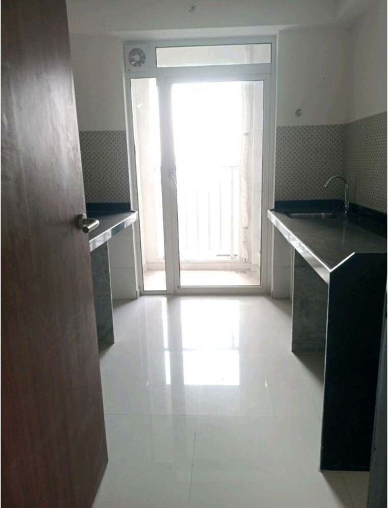 Kitchen, lodha-amara 2 Bedroom 695 Sq.Ft. Apartment In Kolshet Road Thane 10377267