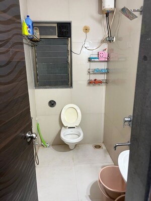Bathroom in 2 BHK Apartment at Kiran Towers, Malad West – for Rent