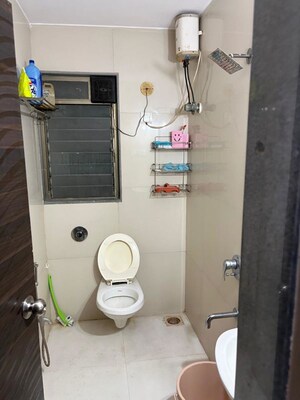 Bathroom in 2 BHK Apartment at Kiran Towers, Malad West – for Rent