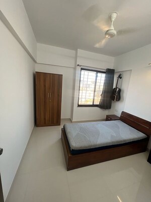 Master Bedroom in 2 BHK Apartment at Roshan Milestone, Tathawade – for Rent