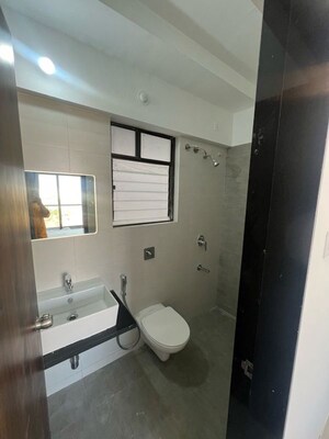 Bathroom in 2 BHK Apartment at Roshan Milestone, Tathawade – for Rent
