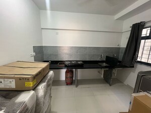 Kitchen in 2 BHK Apartment at Roshan Milestone, Tathawade – for Rent