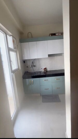 Kitchen in 1 BHK Apartment at VVIP Nest, Raj Nagar Extension – for Sale