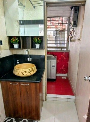 Kitchen in 2 BHK Apartment at VFVA Towers, Majiwada – for Rent