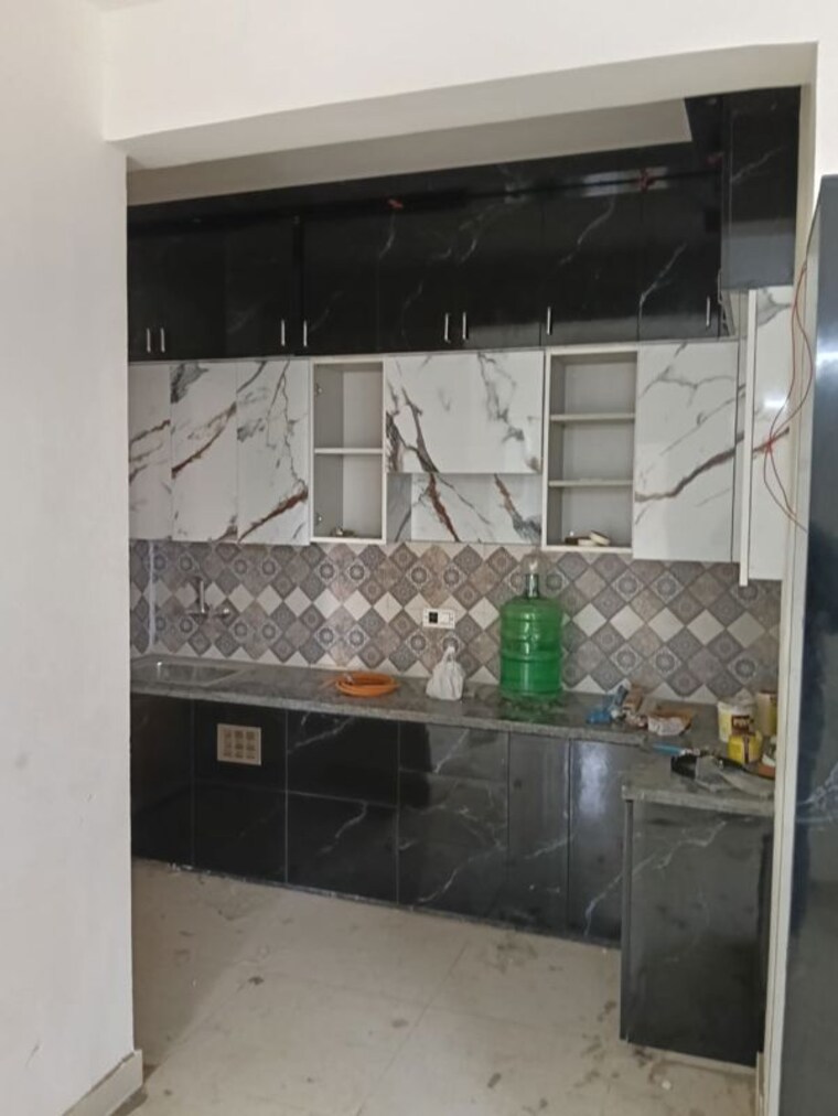 Kitchen, signature-global-the-millennia 2 Bedroom 680 Sq.Ft. Apartment In Sector 37d Gurgaon 10377477