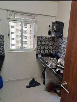 Team Area in 1 BHK Apartment at Lodha Amara, Kolshet Road – for Rent