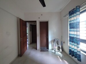 Master Bedroom in 3 BHK Apartment at Mulund West – for Sale