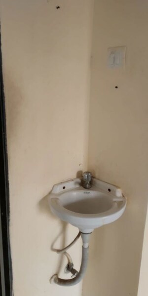 Bathroom in 1 BHK Apartment at Om Sai Heights Phase II, Morya Nagar – for Rent