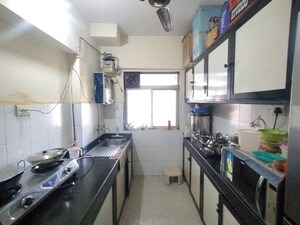 Kitchen in 2 BHK Apartment at Nirmal Lifestyle Residency CHS Ltd, Mulund West – for Rent
