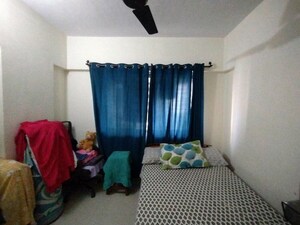 Bedroom in 2 BHK Apartment at Nirmal Lifestyle Residency CHS Ltd, Mulund West – for Rent
