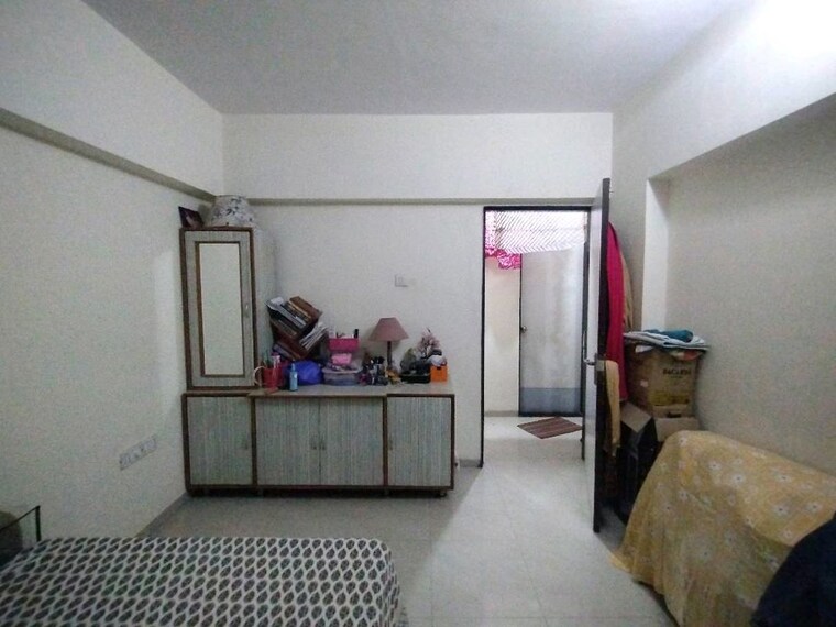 Bedroom, nirmal-lifestyle-residency-chs-ltd 2 Bedroom 900 Sq.Ft. Apartment In Mulund West Mumbai 10377570