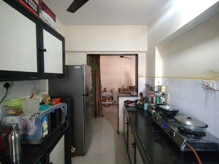 Kitchen, nirmal-lifestyle-residency-chs-ltd 2 Bedroom 900 Sq.Ft. Apartment In Mulund West Mumbai 10377570