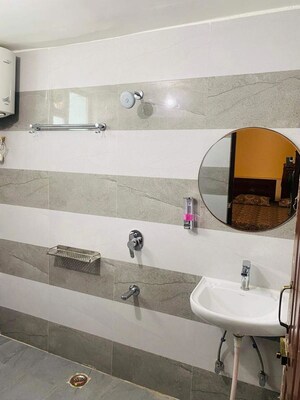 Bathroom in 3 BHK Apartment at Rewarding Udhyam Vatika, Manrauli – for Rent