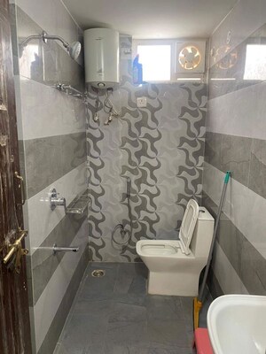 Bathroom in 3 BHK Apartment at Rewarding Udhyam Vatika, Manrauli – for Rent